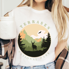 White Terrasen National Park t-shirt with circular stag badge — Throne of Glass merch inspired by Sarah J. Maas