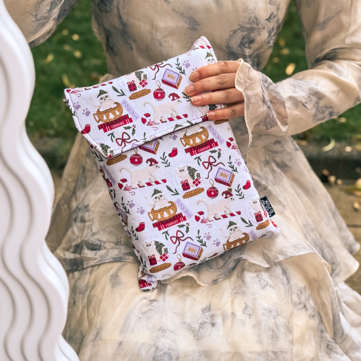 Charlie Christmas padded book sleeve