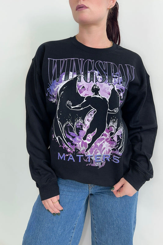 Wingspan Matters Sweatshirt — bookish merch by Caffeine and Curses. Big wings, bigger romance. Hand-designed in Australia.