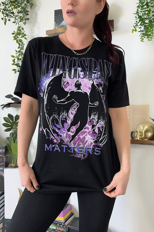 Wingspan Matters T-Shirt — bookish merch by Caffeine and Curses. Big wings, bigger romance. Hand-designed in Australia.