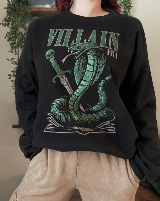 Villain Era Sweatshirt — bookish merch by Caffeine and Curses. Welcome to your villain era — soft for no one. Hand-designed in Australia.