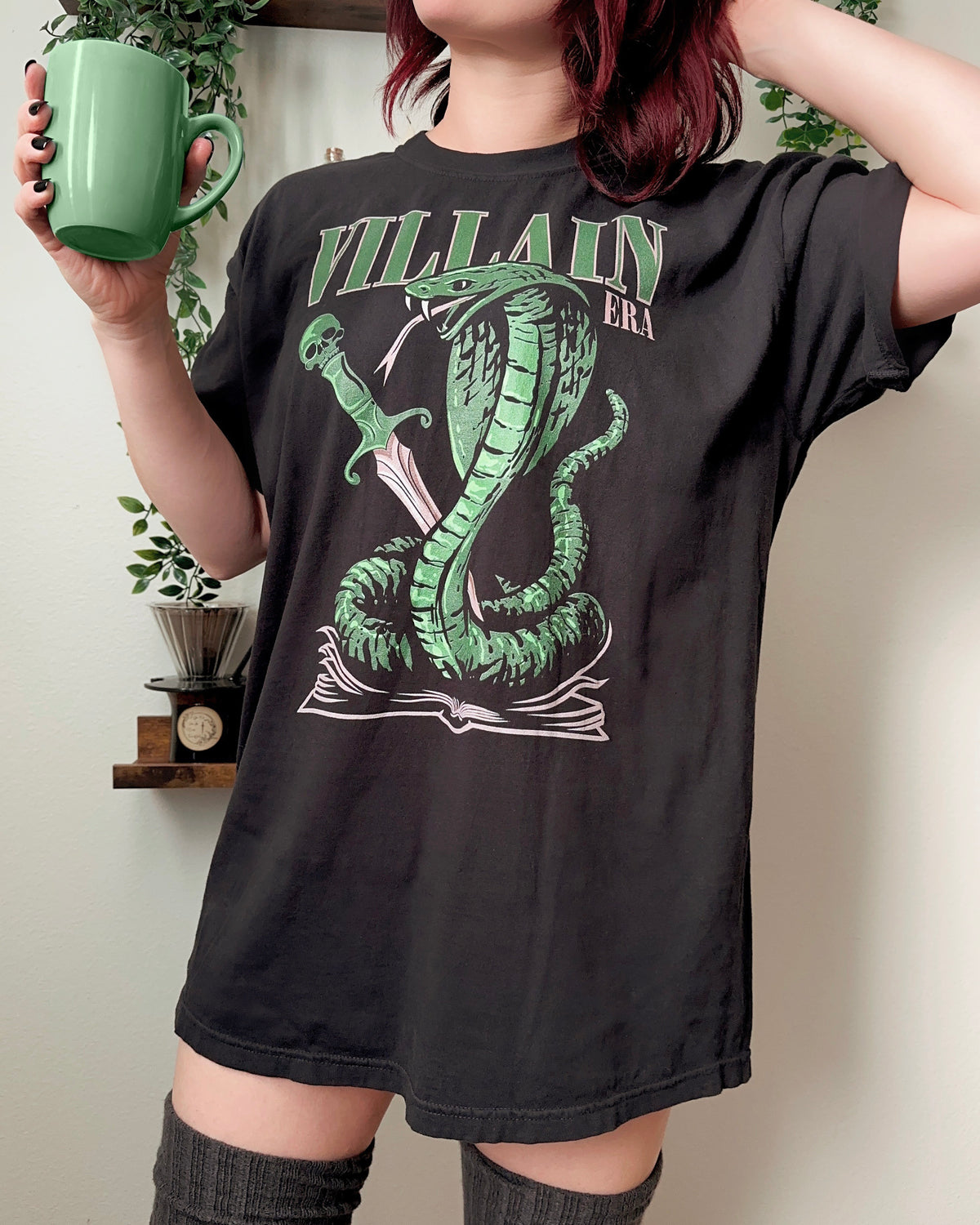 Villain T-Shirt — bookish merch by Caffeine and Curses. Welcome to your villain era — soft for no one. Hand-designed in Australia.