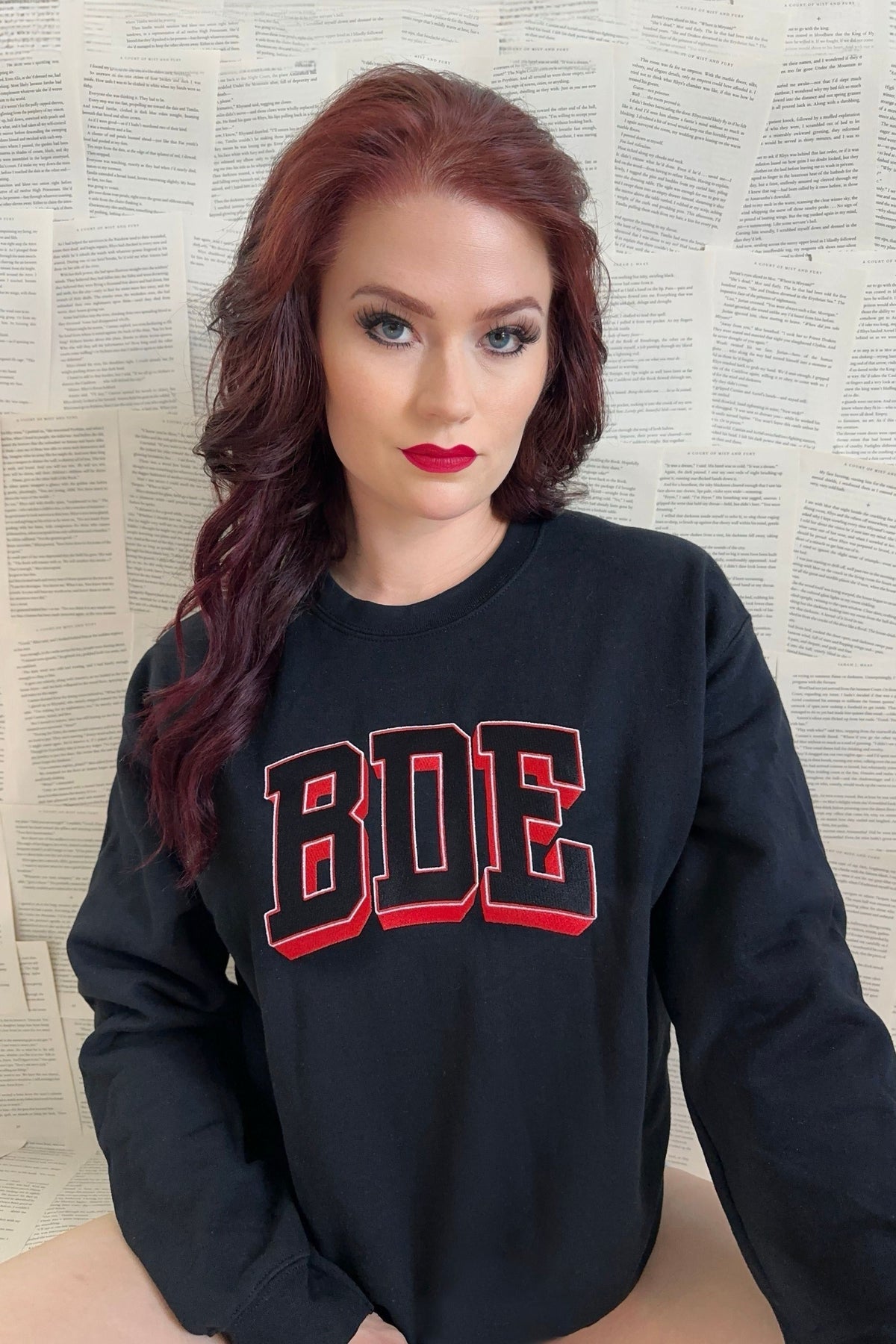 BDE Embroidered Sweatshirt — Hades merch by Tate James. The energy you bring to the room — embroidered loud. Hand-designed in Australia, officially licensed.