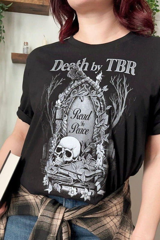Death By TBR Vol 2 T-Shirt — bookish merch by Caffeine and Curses. The to-be-read pile that will outlive us all. Hand-designed in Australia.