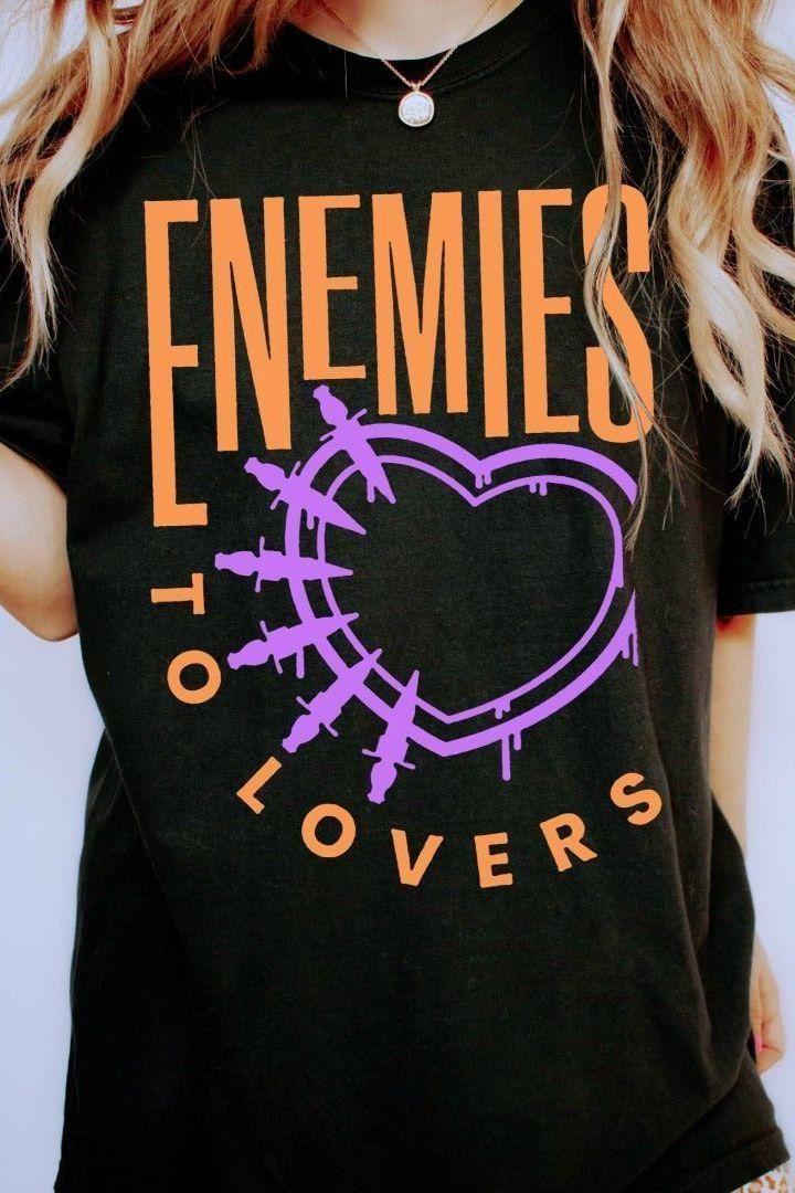Enemies To Lovers Vol.2 T-Shirt — bookish merch by Caffeine and Curses. The trope that keeps wrecking you. Hand-designed in Australia.