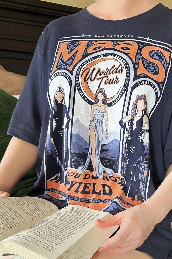 Maasverse T-Shirt — Sarah J. Maas merch. Bryce, Feyre, Aelin — the Maas World Tour. Three series, one queen. Hand-designed in Australia, officially licensed.