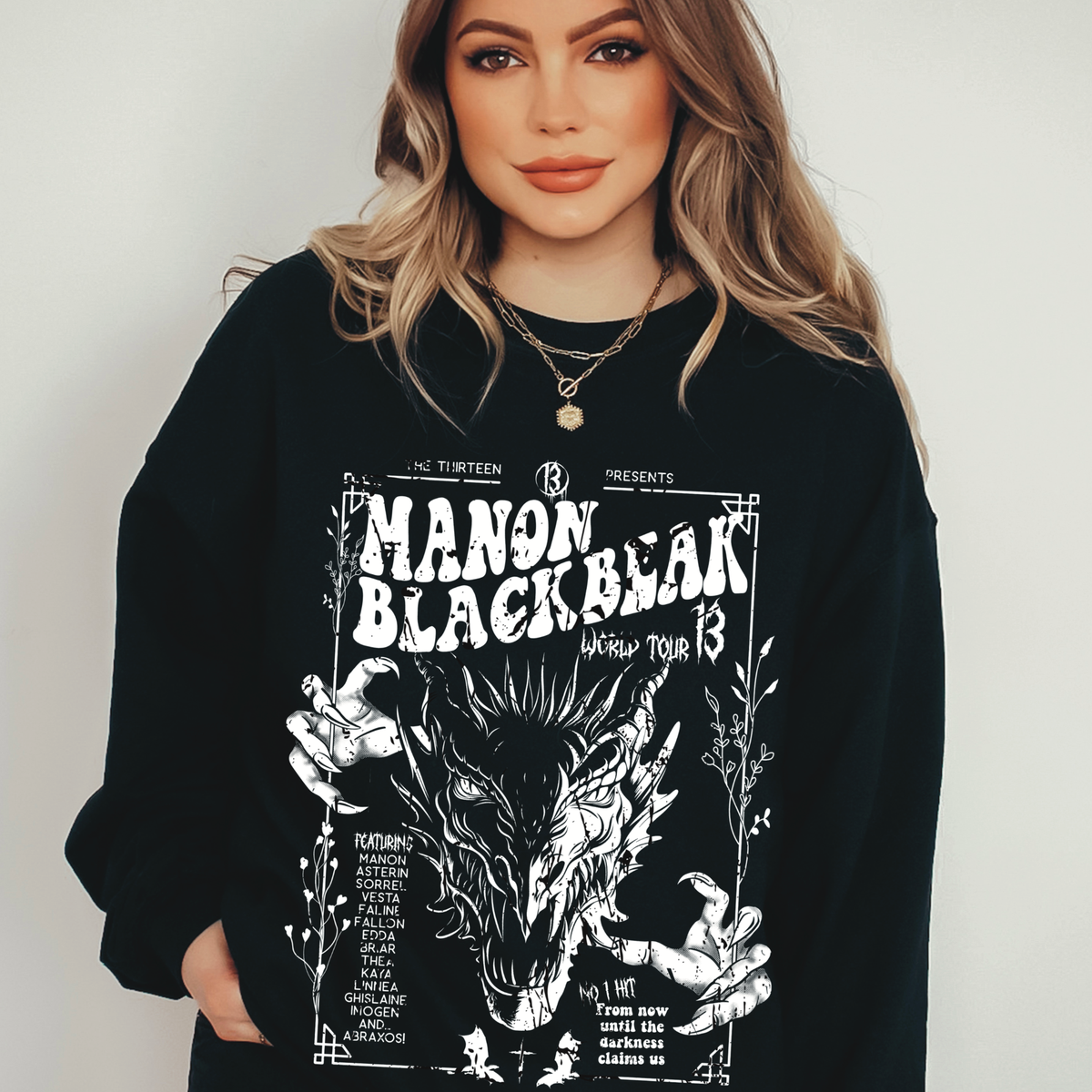 Model wearing the black Manon Blackbeak sweatshirt — Throne of Glass merch inspired by Sarah J. Maas