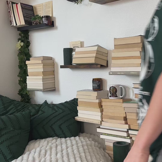 Try-on video: the dark green Rowan Whitethorn t-shirt — the vertical WHITETHORN lettering beside the hawks and 'to whatever end', ending on a close flat-lay of the print [focal 50 45]