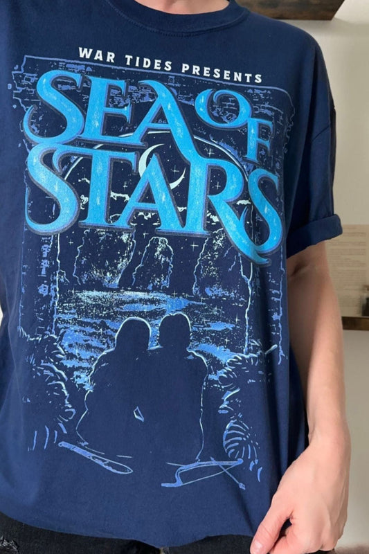 Sea of Stars T-Shirt — Bridge Kingdom merch by Danielle L. Jensen. The sea that hides a kingdom. Hand-designed in Australia, officially licensed.