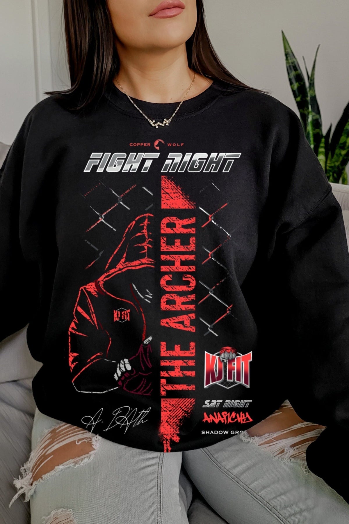 The Archer Sweatshirt — Madison Kate merch by Tate James. The brother who aims true. Hand-designed in Australia, officially licensed.