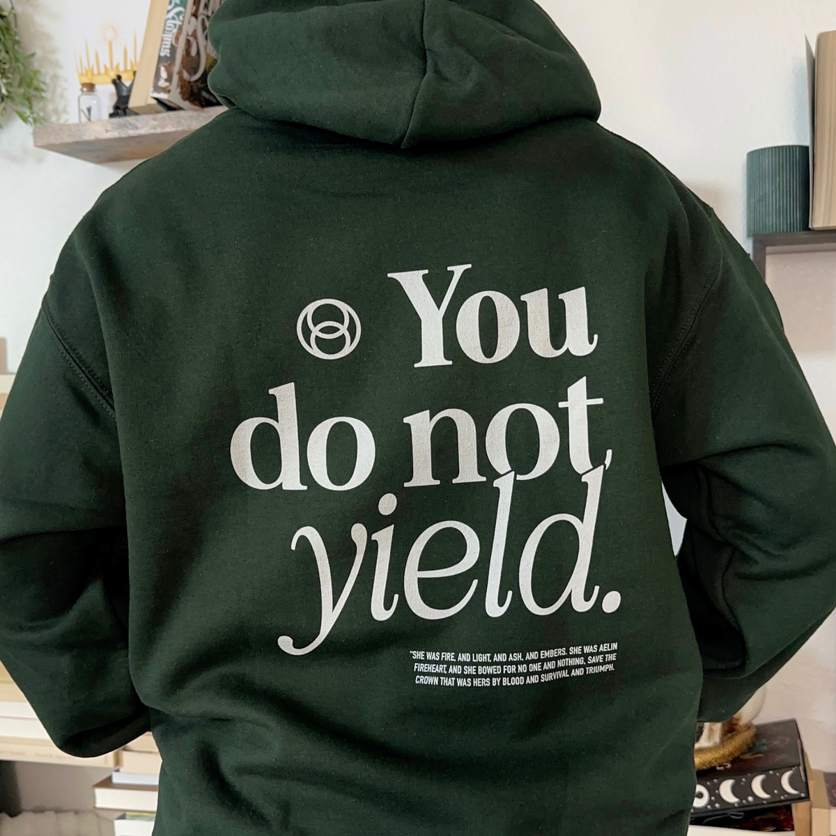 Model wearing the You Do Not Yield hoodie — Throne of Glass merch inspired by Sarah J. Maas